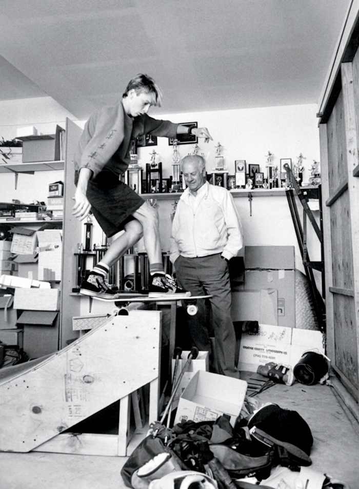 Hawk practicing in the garage with his father.